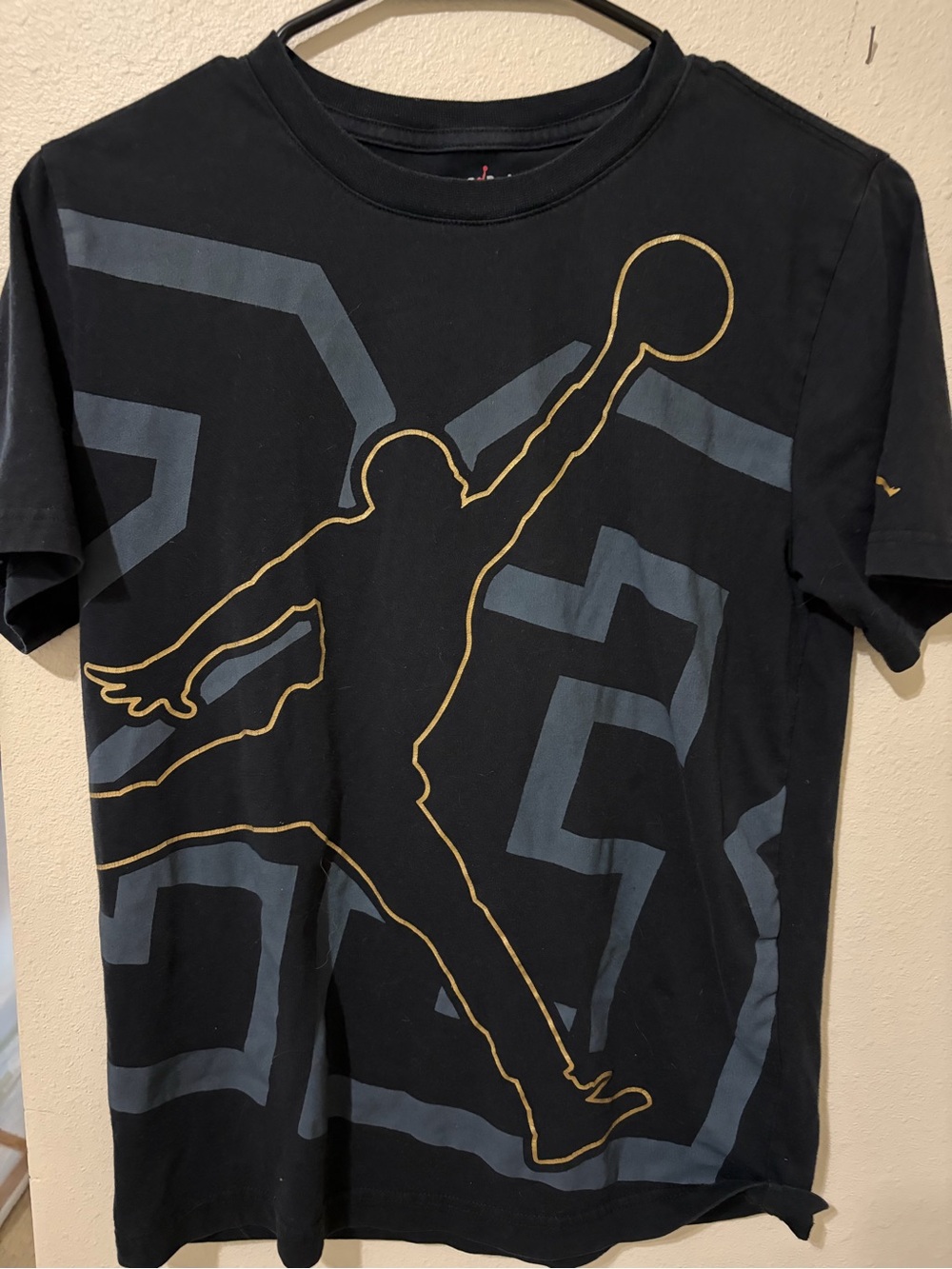 Jordan Black Tee with Gold Outline Jumpman and Gray Graphic, size 12-13